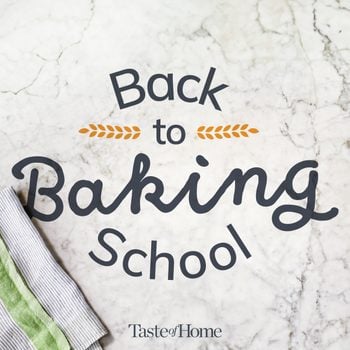 Back To Baking School 2025 logo text on marble surface background with kitchen towel in the corner